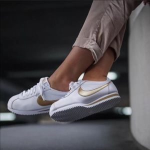 white and gold cortez womens